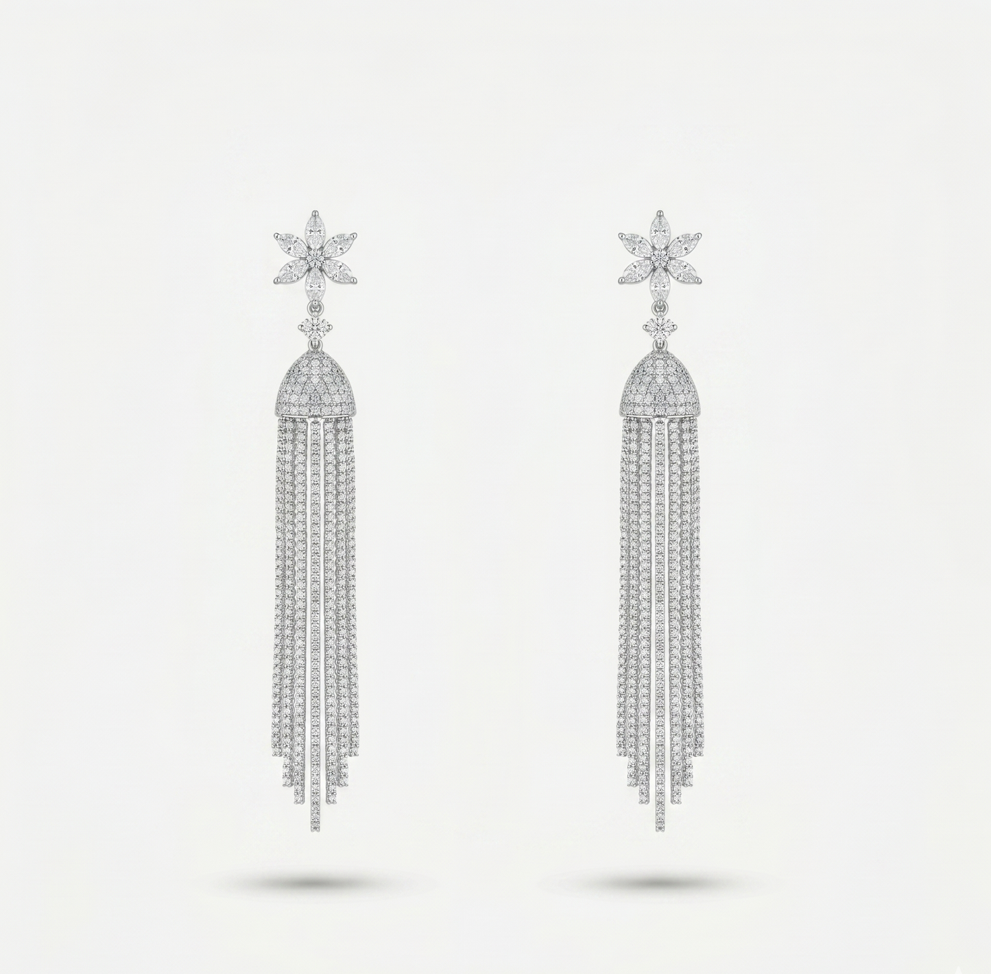 Boucles d'oreilles à pompons en acier inoxydable argenté