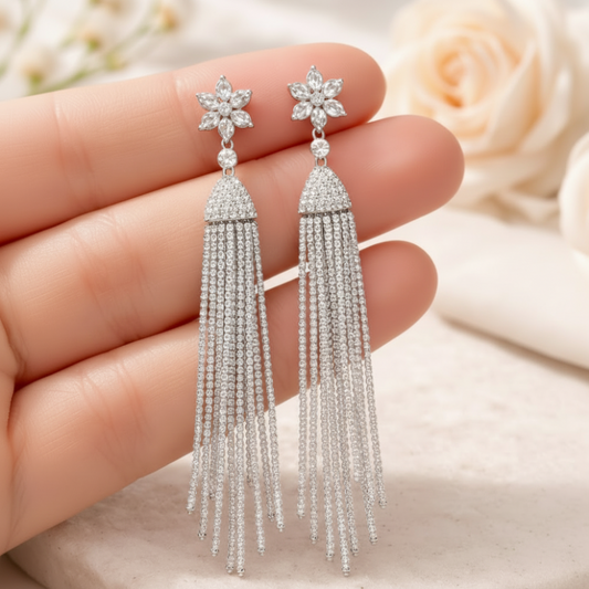 Boucles d'oreilles à pompons en acier inoxydable argenté